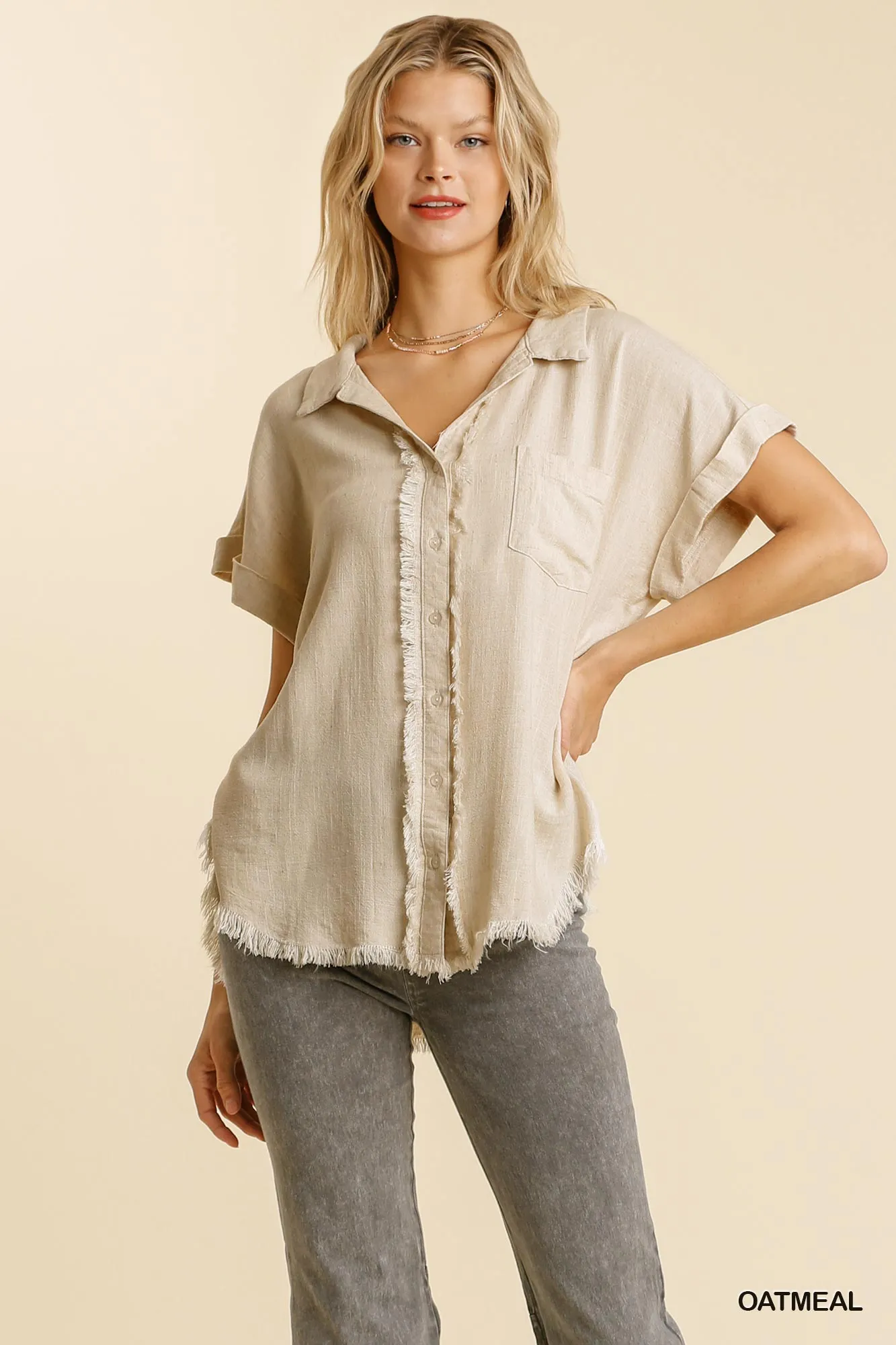 Linen blend button down collar folded sleeve top with chest pocket and frayed edged hi-low hem